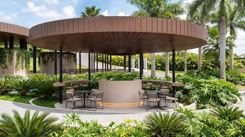 Espacio de coworking al aire libre bajo cubierta circular, entre jardines